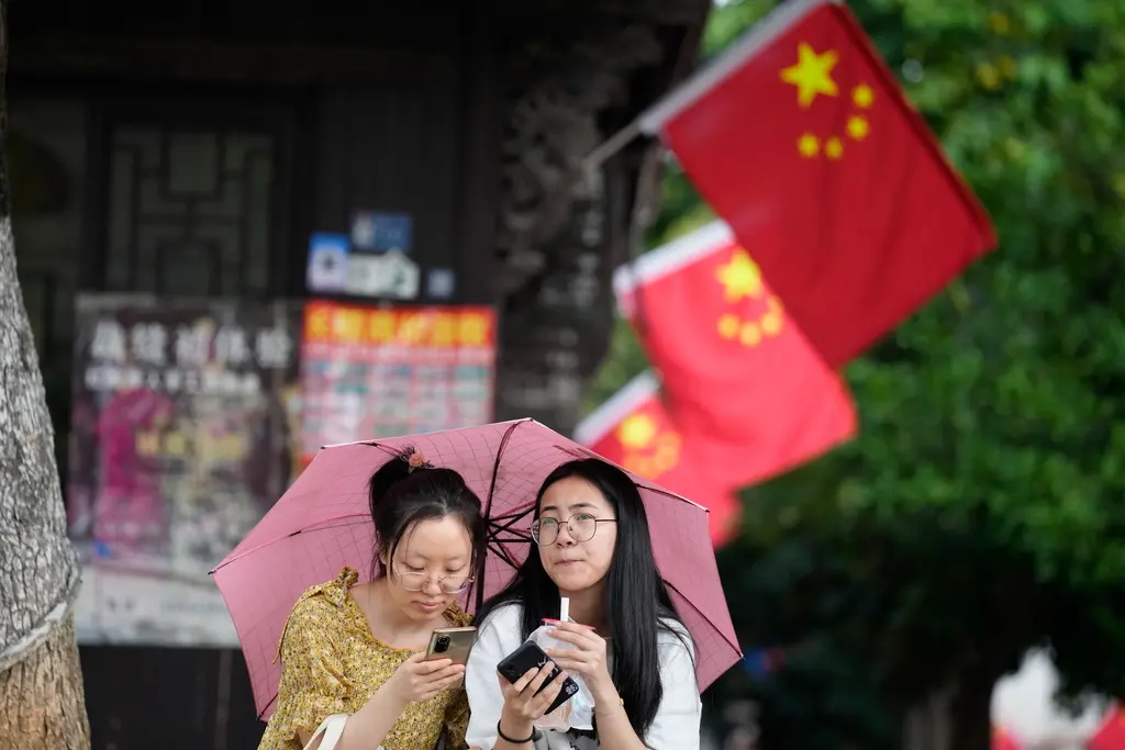 ▲中國2023年的「十一長假」共有8天，中國官媒《人民日報》統計，光是在假期的前3天，選擇在國內旅遊的人數就高達3.95億人。（圖／美聯社／達志影像）