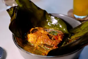 ▲喀拉拉的葉包魚，是印度最南端的喀拉拉海鮮料理手法，魚肉吃起來香嫩無比。（圖／記者葉盛耀攝）