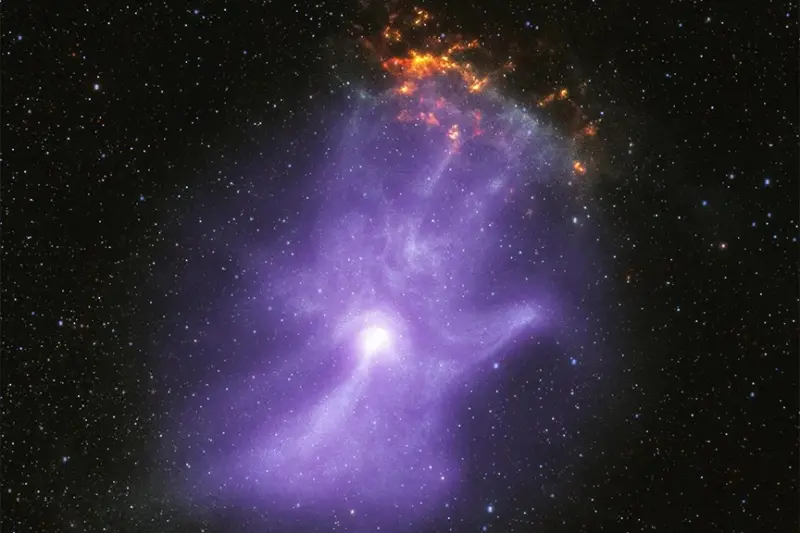 ▲美國太空總署（NASA）分享了一張X射線太空望遠鏡捕捉到的脈衝星風雲（PWN）X光透視圖，看起來就像是有人朝著宇宙伸出一隻巨大的手掌，十分有趣。（圖／翻攝自NASA官網）
