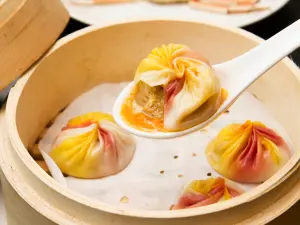 點水樓有大閘蟹口味的小籠包,裡頭內餡包有蟹肉,滋味更鮮。(圖/點水樓提供) ▲點水樓有大閘蟹口味的小籠包,裡頭內餡包有蟹肉,滋味更鮮。(圖/點水樓提供)