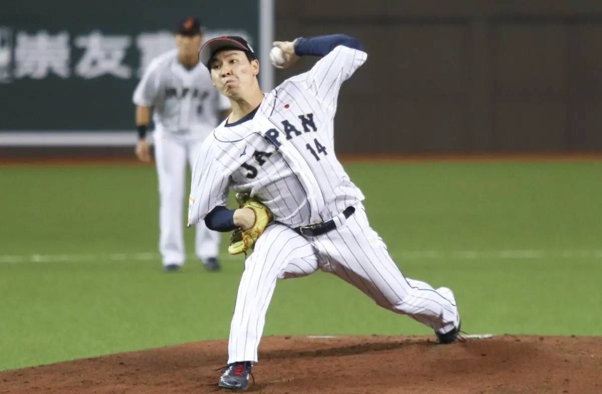 ▲亞錦賽日本先發投手加藤三範熱身卻被開球打斷。（圖／棒協提供）