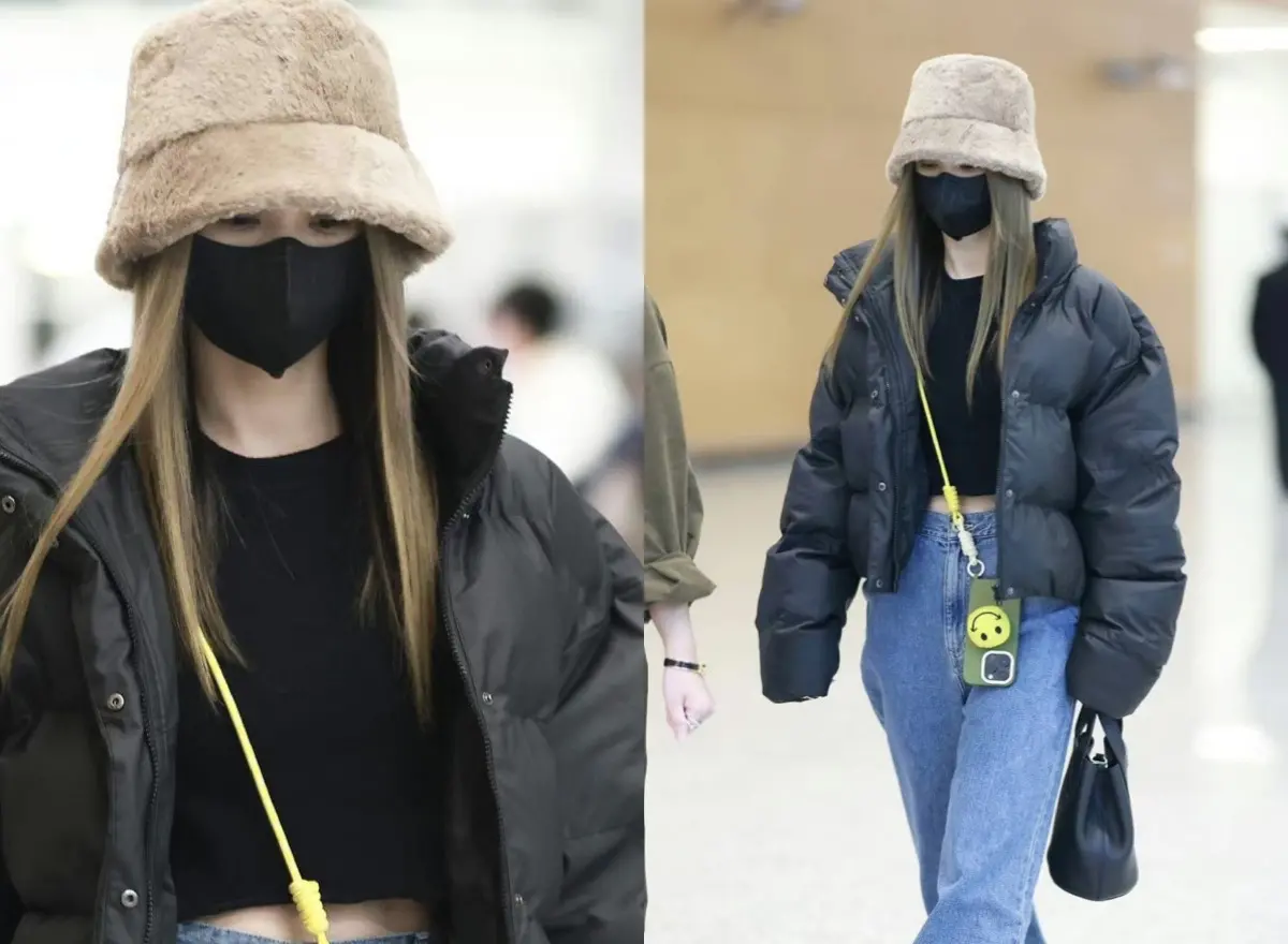 ▲楊丞琳失言風波後首度現身，被目擊包緊緊出現在成都機場，低調不發一語，直到粉絲向她說掰掰後才揮手示意。（圖／翻攝自微博）