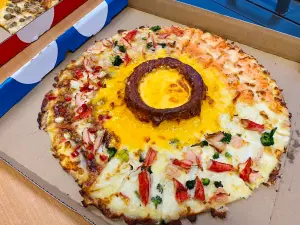 ▲推薦「海鮮火山四喜披薩」，是達美樂最暢銷的海鮮戀人口味組成，海味滿滿。（圖／記者蕭涵云攝）