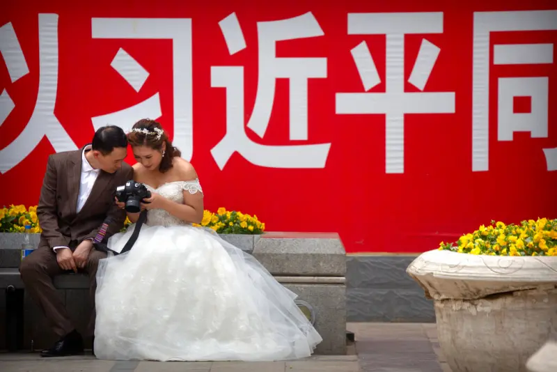▲中國經濟放緩、失業率飆高，經濟前景不佳使得年輕人不願意結婚。（圖／美聯社／達志影像）
