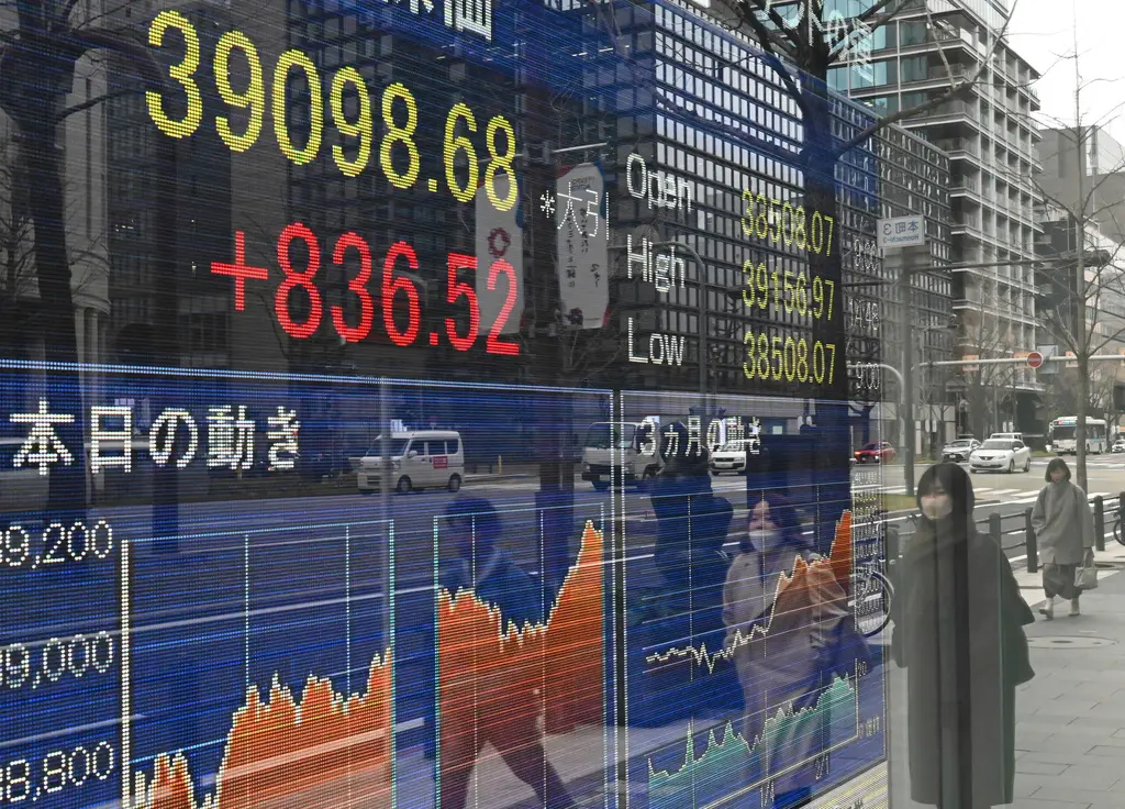▲日本日經225指數22日大漲836.52點，收在39098.68點，時隔34年再創新高。（圖／美聯社／達志影像）
