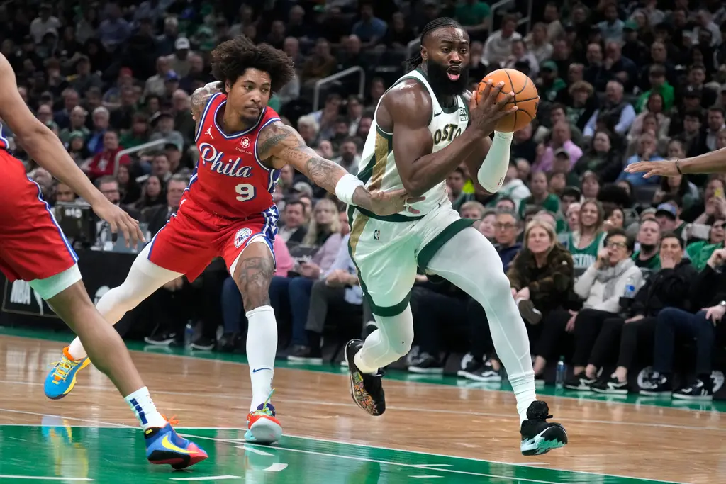 ▲綠衫軍Jaylen Brown、Jayson Tatum聯手轟下60分，塞爾提克主場擊敗76人，狂掃9連勝。（圖／美聯社／達志影像）
