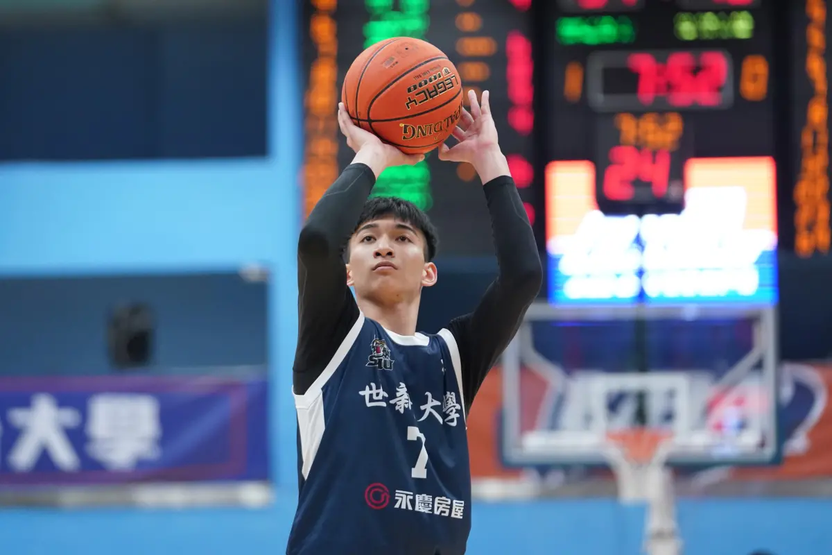 ▲世新張俊生投進3記外線，拿下21分。（圖／大專體總提供）