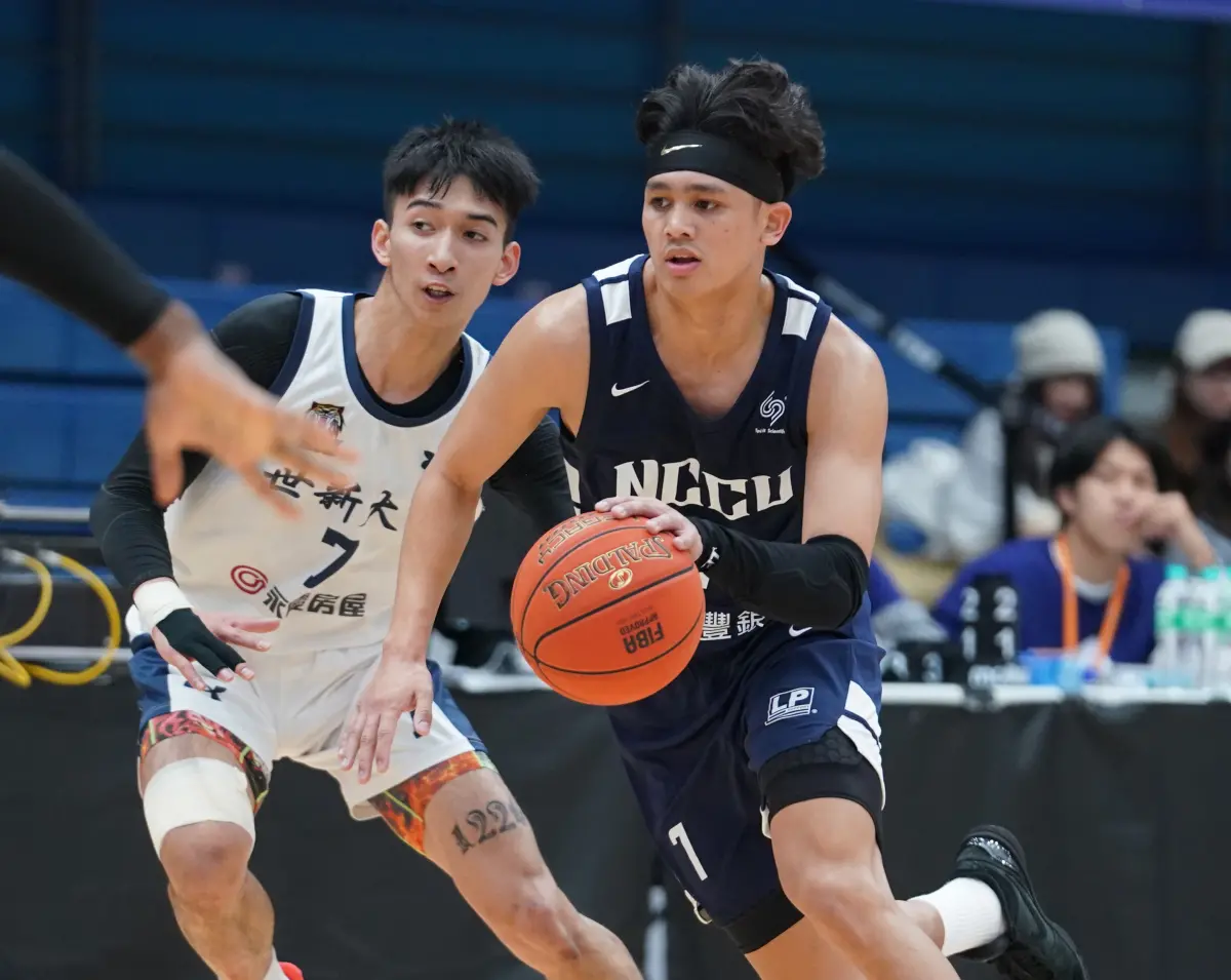 ▲政大游艾喆本場達成UBA新紀錄600助攻。(圖／大專體總提供)