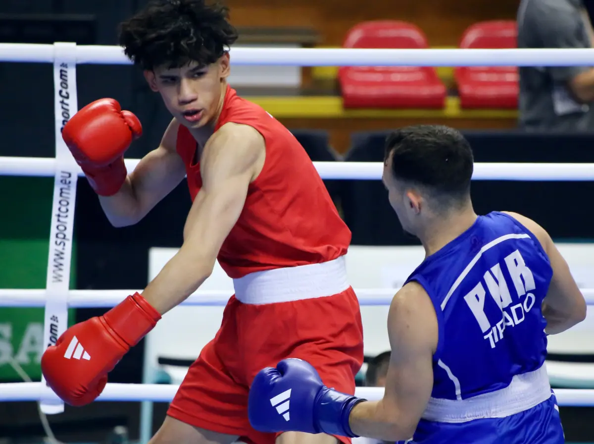 ▲全力追擊拚到抽筋，李承威力挽狂瀾未果遭淘汰。(圖/拳擊協會提供)