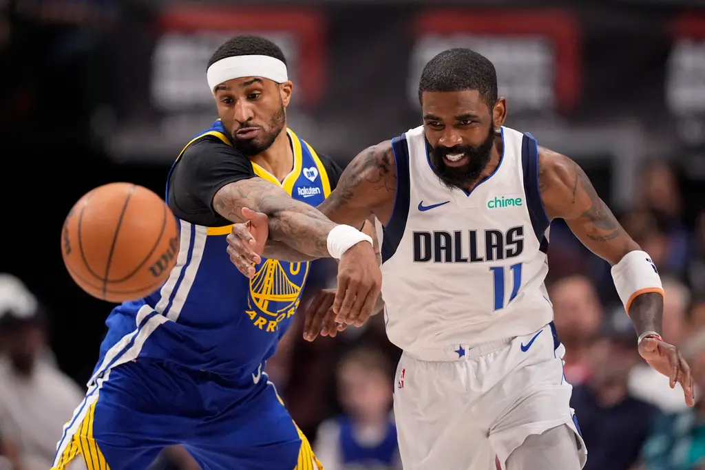 ▲獨行俠Kyrie Irving繳出23分、10助攻、8籃板「準大三元」表現，率隊擊敗金州勇士。（圖／美聯社／達志影像）