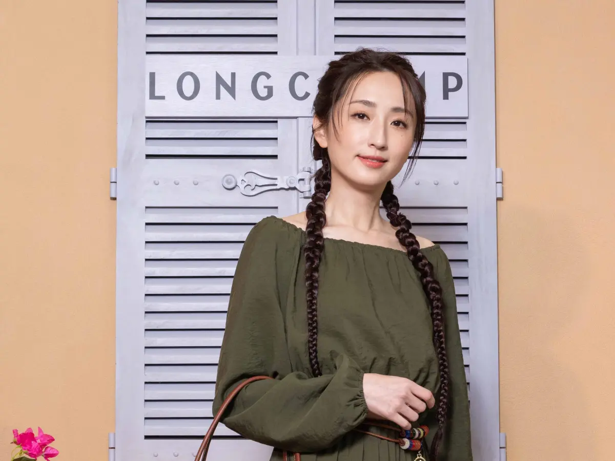 ▲坤達笑稱老婆是演藝圈最大收穫，讓柯佳嬿害羞地說「太浮誇」。（圖／LONGCHAMP提供）