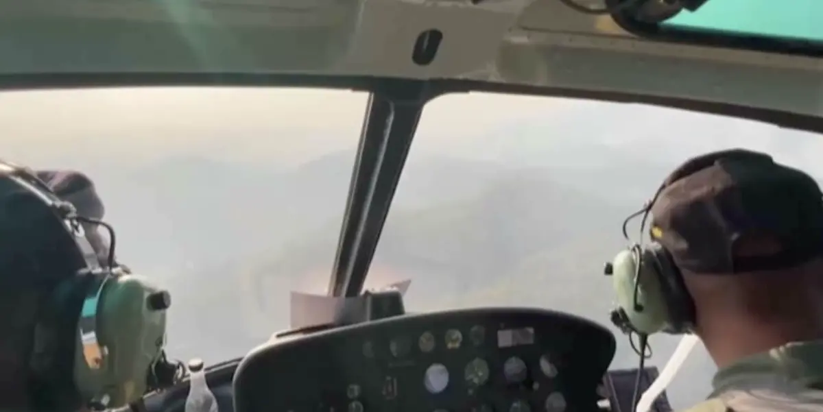 ▲3月29日的空拍清邁山景影片中可看到，濃重的霧霾蔓延山頂。（圖／翻攝自影片）