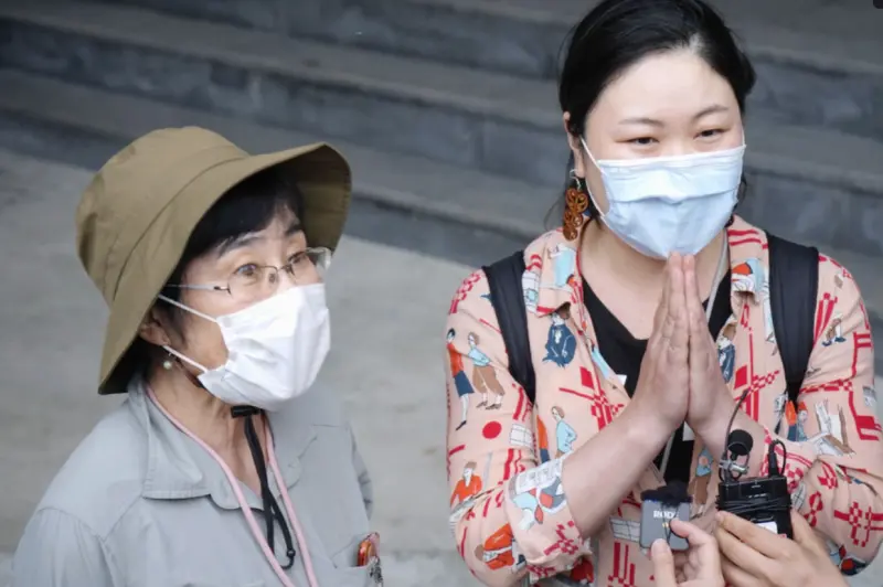 ▲一對受困晶英酒店的日本母女，今（5）日順利撤離，母女接受日本媒體訪問時，多次表達對台灣人的感激之情。（圖／翻攝自共同社）