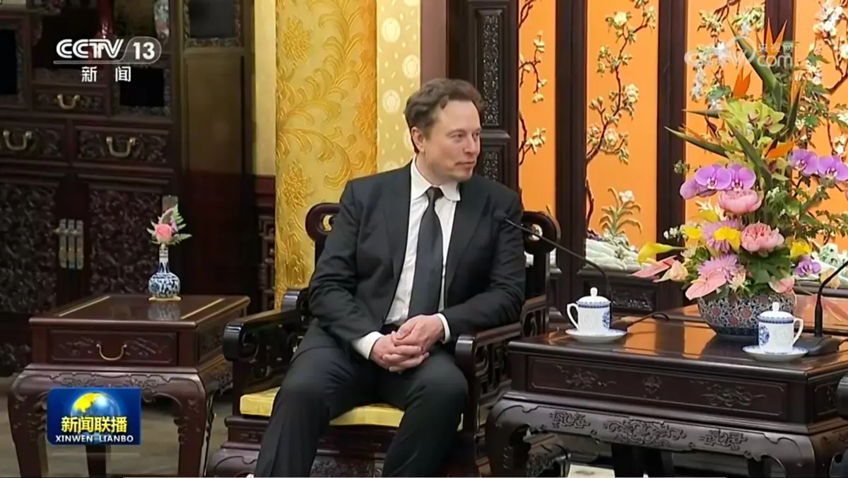 ▲▲中國國務院總理李強週日（28）會見美國電動車廠商特斯拉（Tesla）執行長馬斯克（Elon Musk）。李強稱，特斯拉在中國的發展堪稱中美經貿合作的成功典範。（圖／翻攝自《央視》節目「新聞聯播」）
