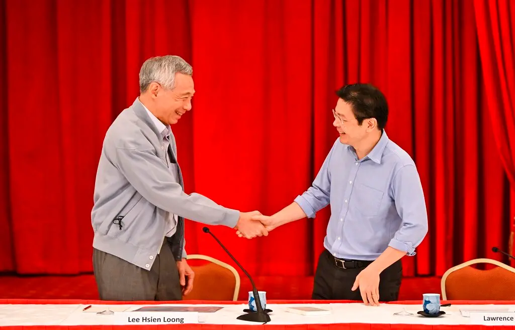 ▲51歲的黃循財今（13）日從72歲李顯龍手中，接下新加坡總理的重任。資料照。（圖／美聯社／達志影像）