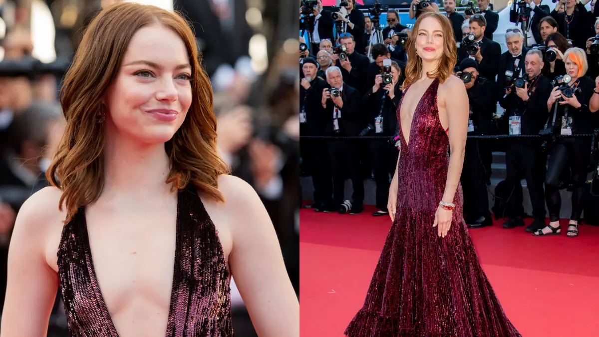 ▲艾瑪史東性感現身坎城影展，深V開衩到肚臍「僅遮2點」辣翻全場。（圖／美聯社／達志影像）