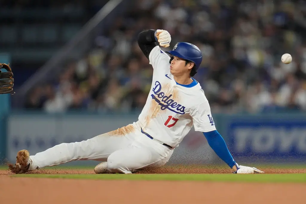 ▲大谷翔平單場兩盜，本季盜壘成功率依舊是完美的100%，連金手套捕手都沒輒。（圖／美聯社／達志影像）