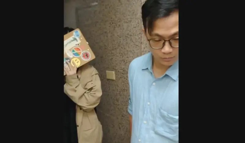 ▲有一對男女冒名記者身分闖進立法院中興大樓。(圖/廖偉翔辦公室提供)