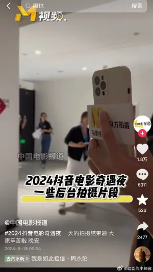 ▲央視PO出拍攝手機上的LOGO,打臉周也說法。(圖/微博) ▲央視PO出拍攝手機上的LOGO,打臉周也說法。(圖/微博)