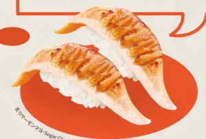▲爭鮮彰化家樂福店「焦糖鮭魚」加量1+1貫只要40元。（圖／翻攝自爭鮮迴轉壽司FB）