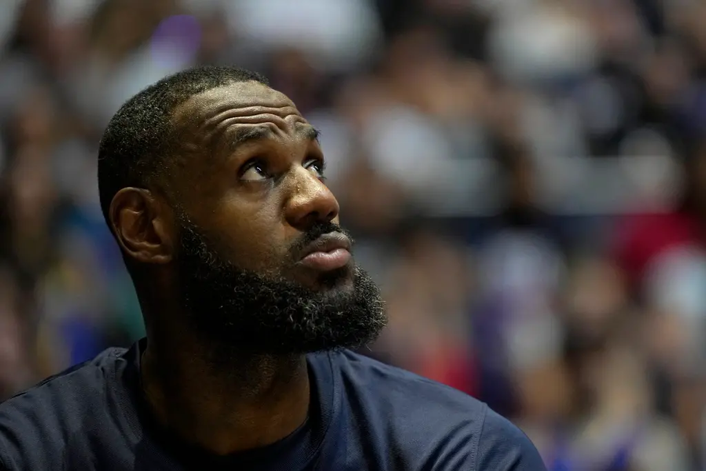 ▲美國男籃在熱身賽最終戰以92：88戰勝德國，「詹皇」LeBron James以39歲之齡在末節連得11分，全場攻下20分，而他也從南蘇丹熱身賽後，得到啟發。（圖／美聯社／達志影像）