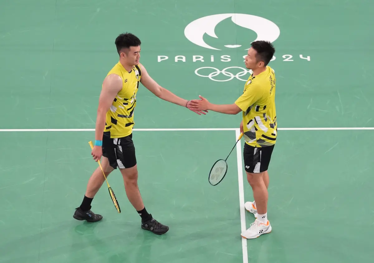 ▲「麟洋配」李洋／王齊麟今（2）日擊敗對決丹麥組合，挺進巴黎奧運羽球男雙金牌戰，也創下奧運「跨屆11連勝」的紀錄。（圖／中華奧會提供）