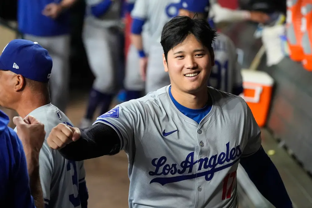 ▲大谷翔平和Tommy Edman都藉由延遲支付策略留在洛杉磯道奇隊，美國媒體認為這會破壞大聯盟的競爭性。（圖／美聯社／達志影像）