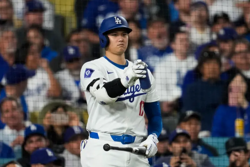 ▲美國職棒大聯盟（MLB)洛杉磯道奇隊日籍二刀流好手大谷翔平，第三打席敲出全壘打，也是本季第52號全壘打，持續往55轟55盜的超級紀錄邁進。（圖／美聯社／達志影像）