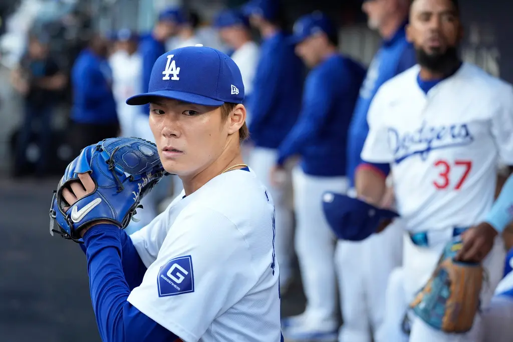 ▲道奇主帥Dave Roberts稍早在賽前記者會上，談到球隊今日必須要先盡全力贏球之外，也提到若系列賽能有G5，先發投手人選將從山本由伸、Jack Flaherty2人當中擇一。（圖／美聯社／達志影像）