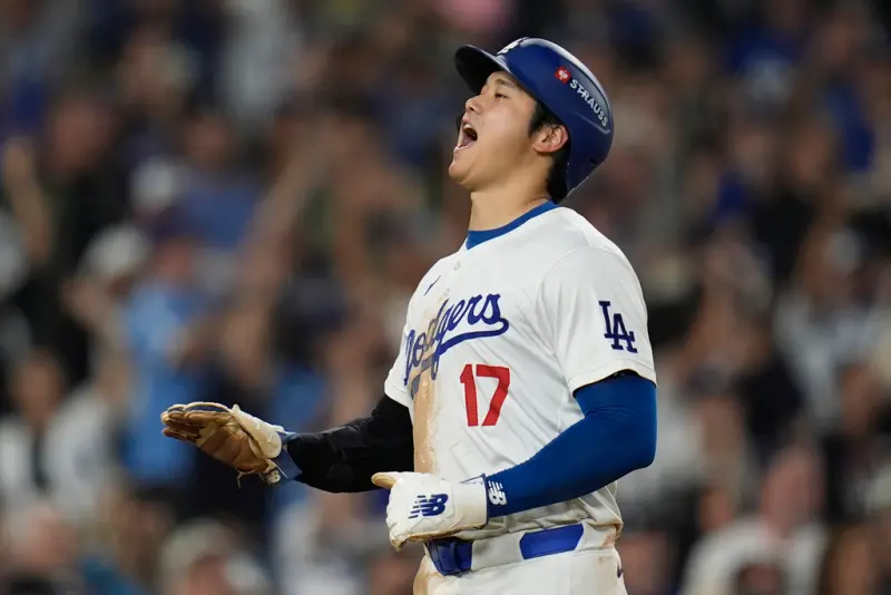 ▲美國職棒大聯盟（MLB）季後賽國聯冠軍戰G1，道奇先發投手Jack Flaherty繳出7局無失分飆6K，加上打線大爆發灌進9分，終場道奇就以9:0完封大都會，拿下國聯冠軍戰G1，大谷翔平此戰繳出雙安1打點的表現。（圖／美聯社／達志影像）