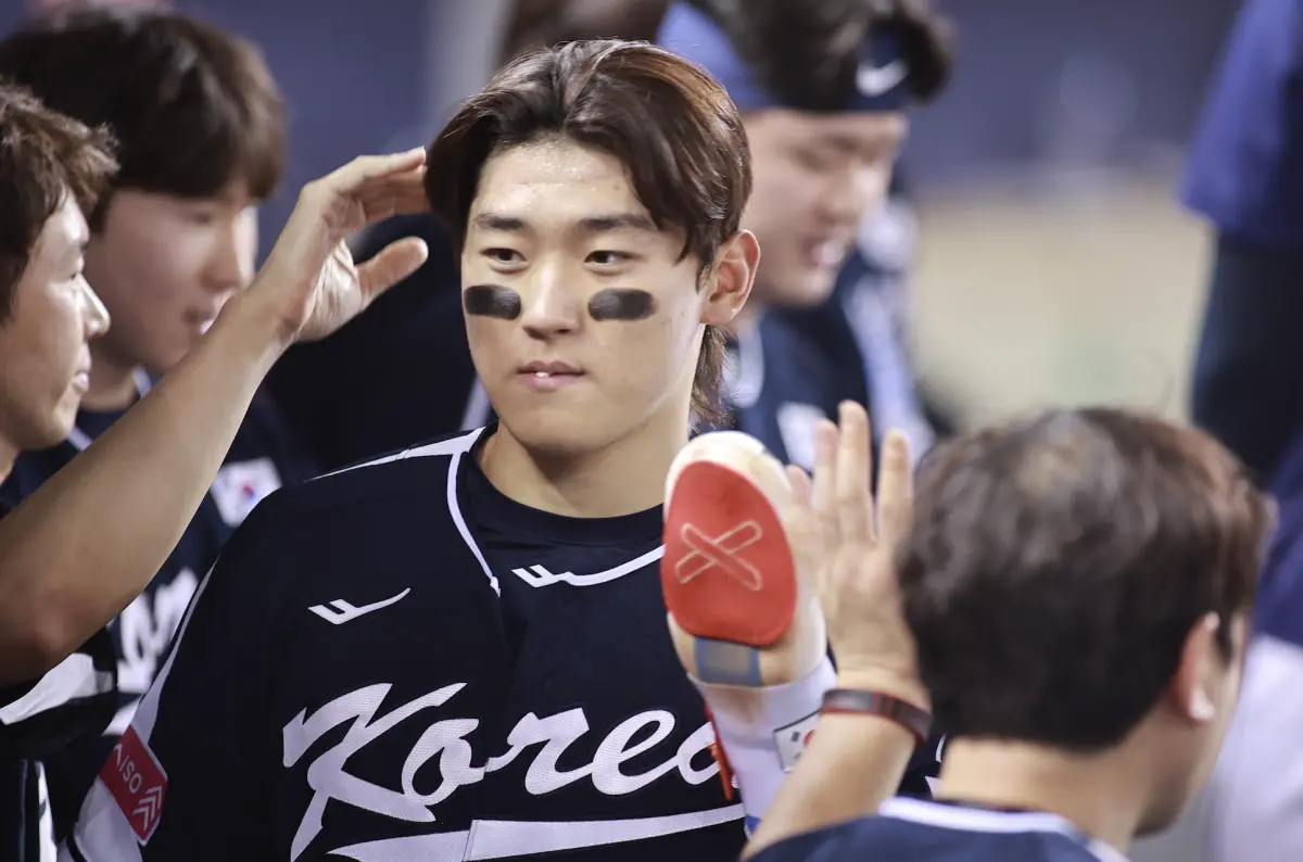 ▲韓國隊今（14）日在天母棒球場面對古巴，靠著金倒永的單場雙響砲、5打點的出色表現，一吐昨天輸球悶氣，擊沉古巴左投Livan Moinelo，終場以8：4贏球。（圖／記者葉政勳攝 ）