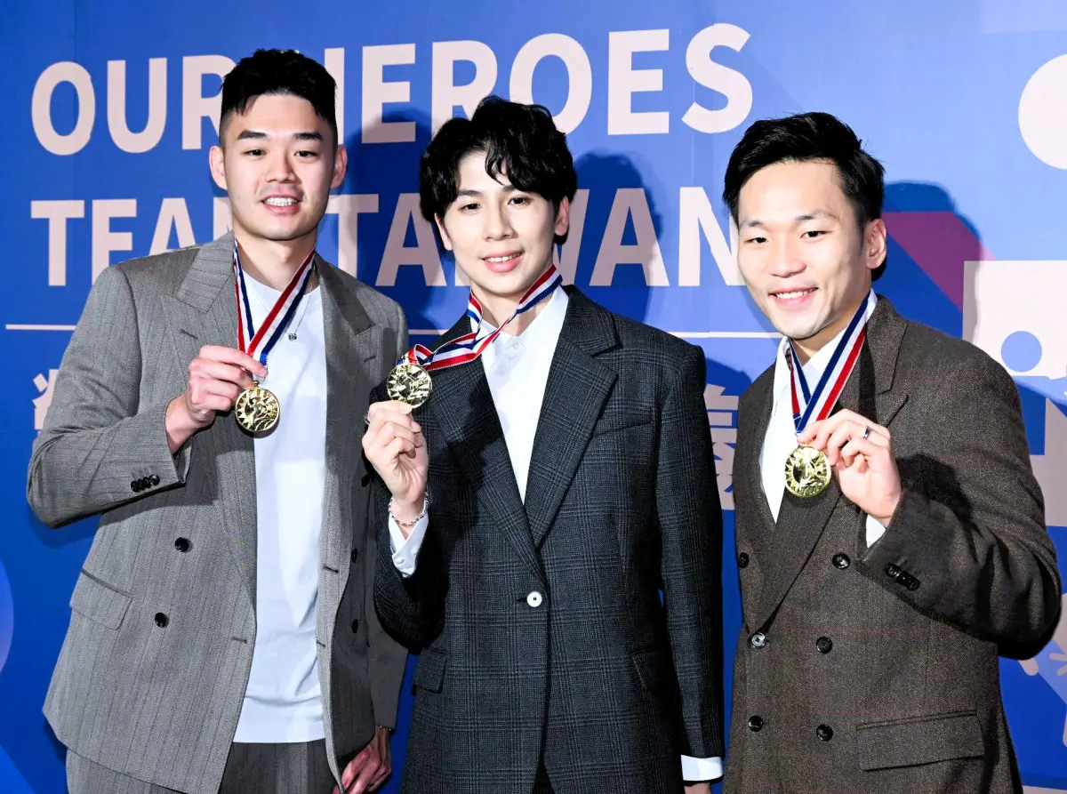 ▲巴黎奧運金牌林郁婷(中)、「麟洋配」李洋、王齊麟都出席113年國光體育獎章頒獎典禮。（圖／記者林調遜攝）