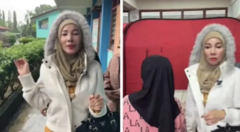 ▲馬來西亞近來飽受水患影響，一名女富商到災區賑災，身上華麗的穿著引發熱議。（圖／翻攝自星州網）