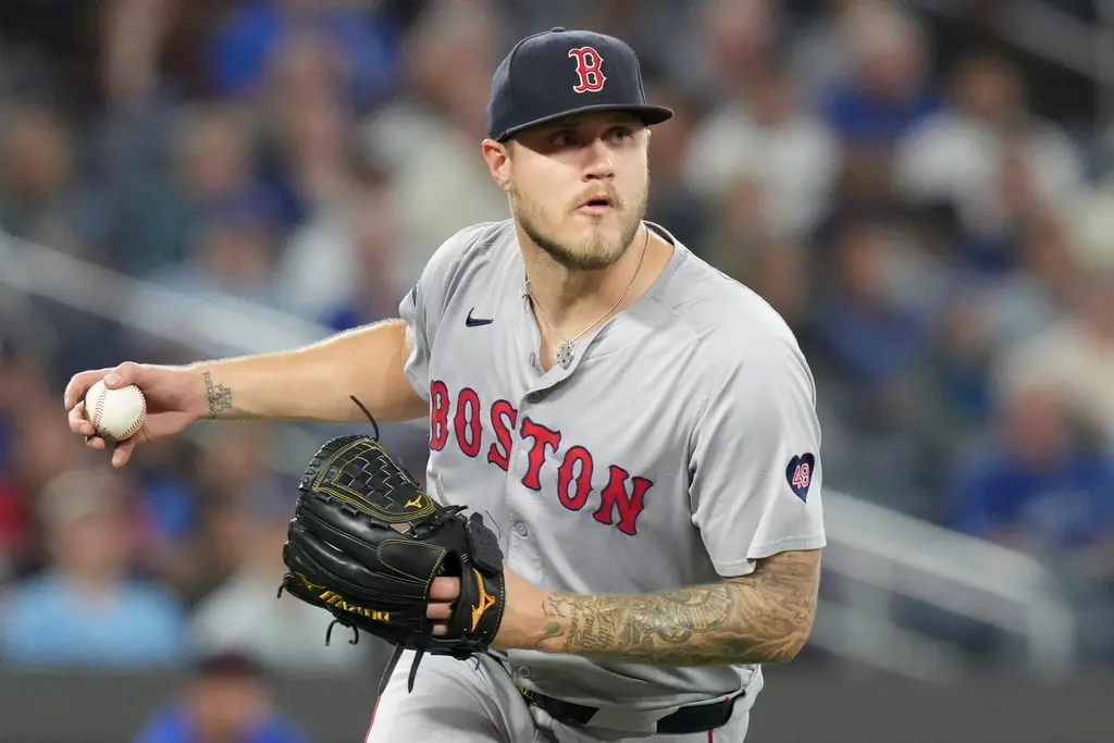 ▲美國職業棒球大聯盟（Major League Baseball）波士頓紅襪明星右投Tanner Houck本季陷入嚴重低潮。今（13）日作客底特律老虎的比賽中，他僅投2.1局就被擊出9支安打、包括2發全壘打，狂失11分，且皆為責失分，寫下生涯最慘一役，也創下大聯盟史上首次不名譽紀錄。終場紅襪以2：14慘遭橫掃，中斷近期的2連勝。（圖／美聯社／達志影像）