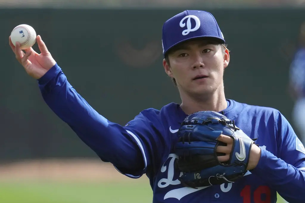 ▲美國職業棒球大聯盟（Major League Baseball）東京海外賽將在3月18日、19日登場，洛杉磯道奇隊的總教練Dave Roberts今（13）日正式宣布，山本由伸將擔任首戰的先發投手，加上日前芝加哥小熊已經公布首戰先發投手為今永昇太，因此海外賽首戰將成為日籍投手內戰。（圖／美聯社／達志影像）