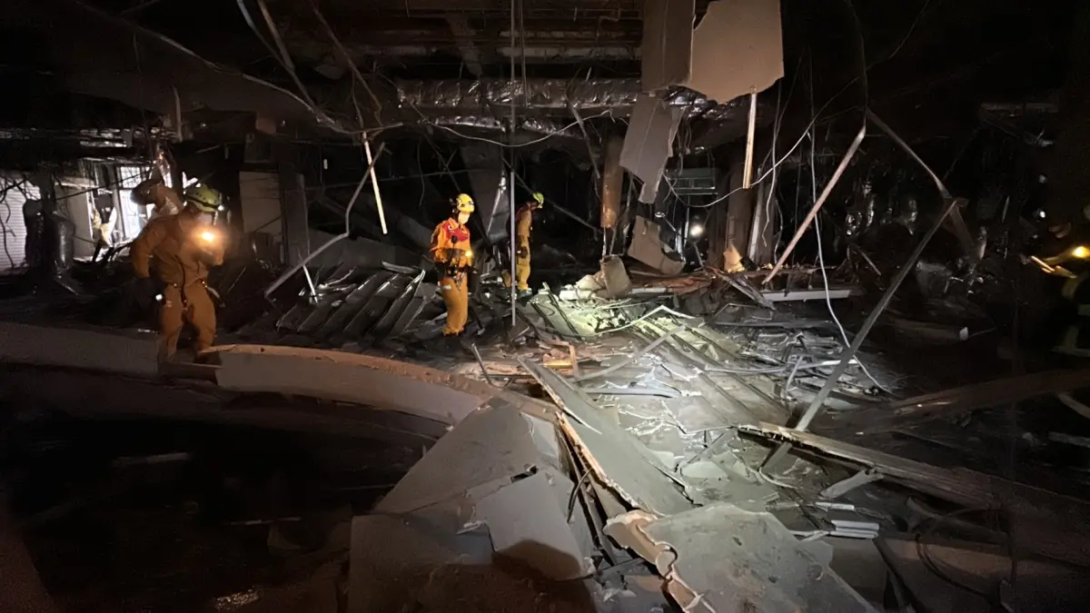 ▲台中一名消防員昨（13）日中午在家突然聽報爆炸聲響，一看手機馬上看見支援訊息，該名消防員立即著裝前往現場支援。（圖／台中市消防局提供）