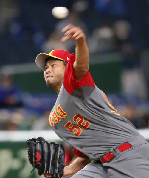 ▲2017年第4屆經典賽，陳用彩改披「龍袍」效力中國隊。（圖／美聯社／達志影像）