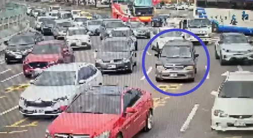 黑色休旅車為躲避員警酒駕攔檢,竟在台北百齡橋上倒車逃逸。(圖/士林分局提供) ▲黑色休旅車為躲避員警酒駕攔檢,竟在台北百齡橋上倒車逃逸。(圖/士林分局提供)