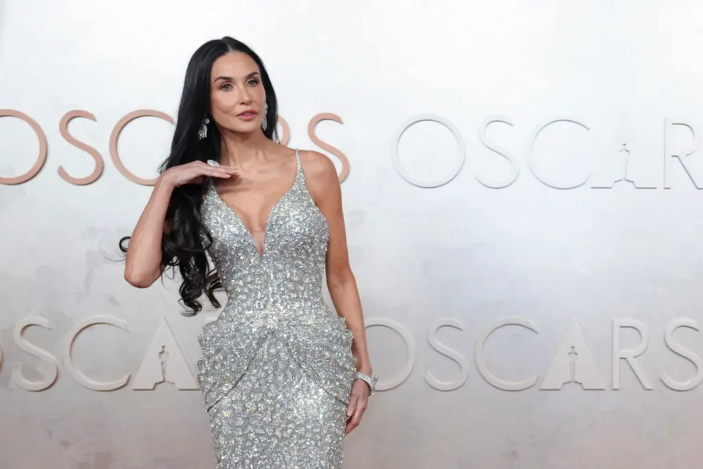 ▲62歲黛咪摩爾在奧斯卡呼聲高卻未得獎，心裡非常失望與難過，在典禮上卻要維持風度，被發現內心真正的心聲。（圖／美聯社／達志影像）