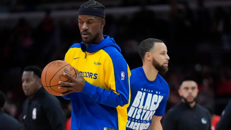 ▲Jimmy Butler（左）到來，徹底解放Curry的進攻火力，各項數據都有所提升，稍早也正式達成生涯4000顆三分成就。（圖／美聯社／達志影像）