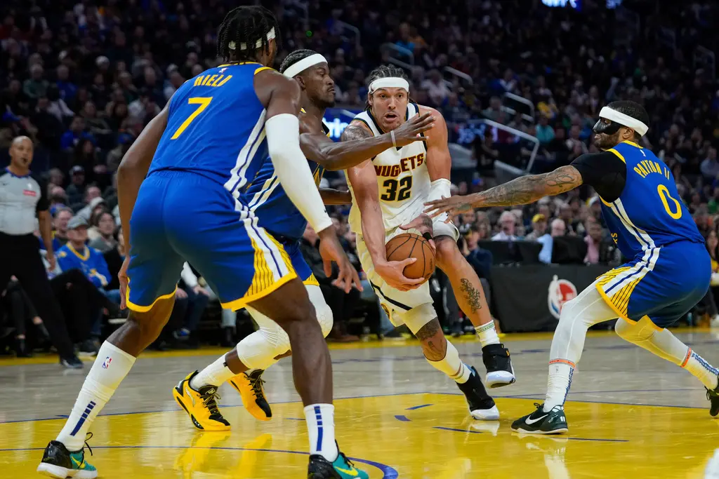 ▲丹佛金塊靠著防守和進攻籃板展現競爭力，在前鋒Aaron Gordon「最強亞軍」全場轟下38分的帶領下，最終以114：105在客場取勝，金州勇士則終止7連勝。（圖／美聯社／達志影像）