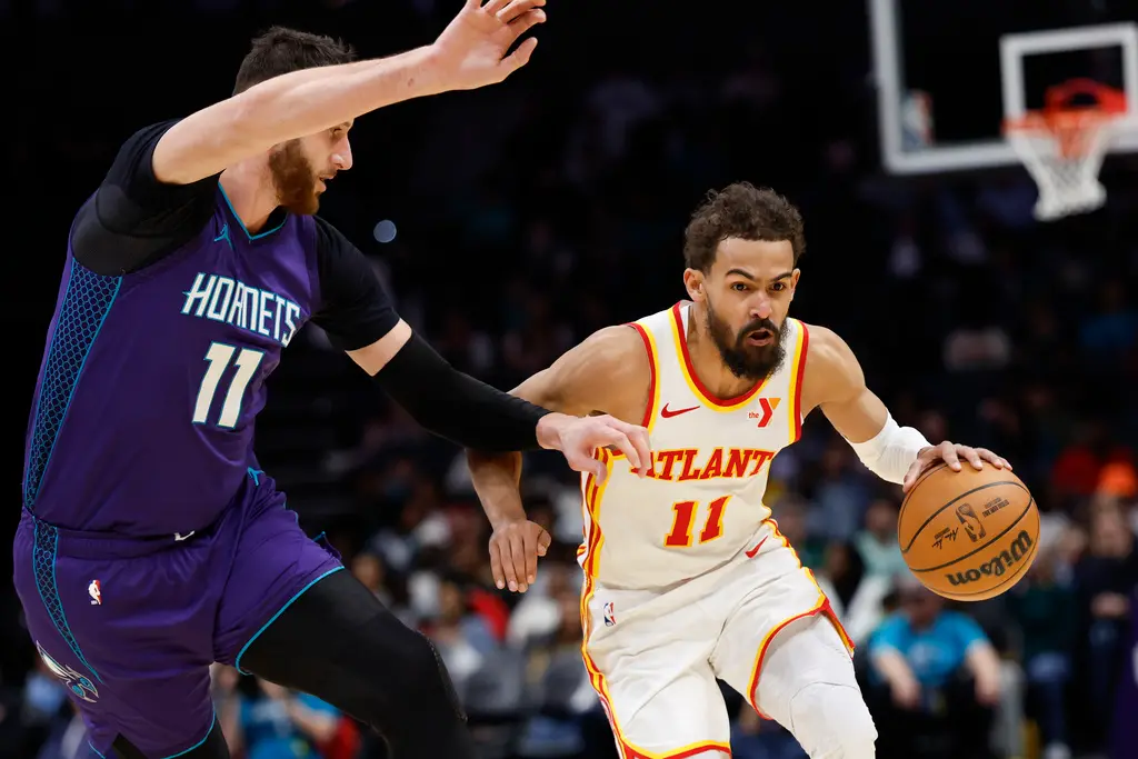 ▲Trae Young手感火燙，全場攻下31分，率領老鷹134：102大勝黃蜂。（圖／美聯社／達志影像）