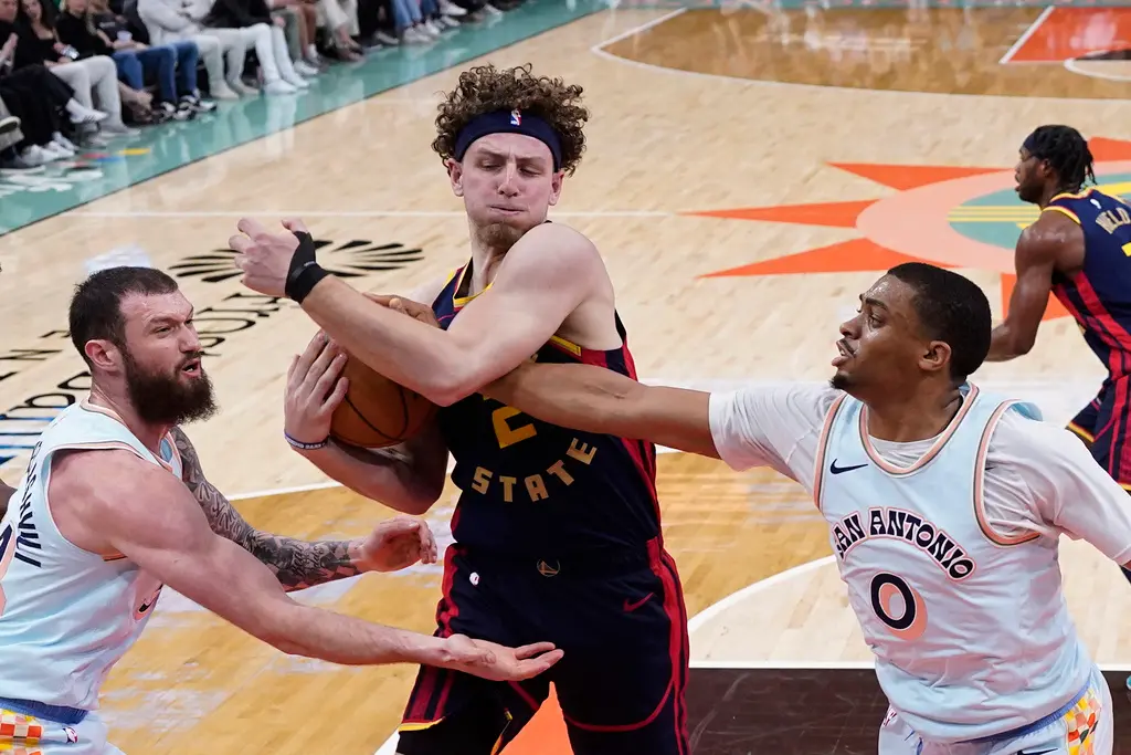 ▲金州勇士在客場迎戰聖安東尼奧馬刺，灣區大軍上半場就取得24分領先，三節打完取得38分領先，終場以148：106擊敗對手，Brandin Podziemski今晚大爆發攻下27分。（圖／美聯社／達志影像）