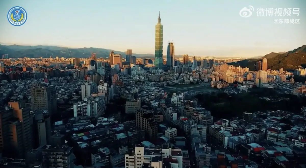 ▲中共軍演宣傳影片出現「台北101」大樓。（圖／翻自微博）