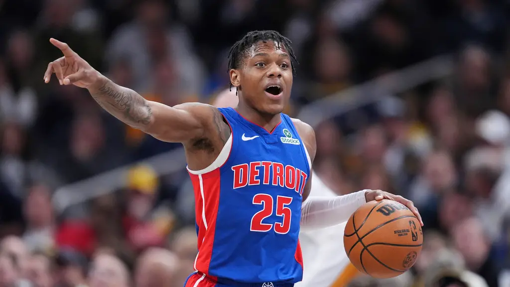 ▲活塞二年級生Marcus Sasser昨戰面對暴龍，投進三分球慶祝後原想效法Morant比出「開槍」手勢慶祝，但隨後可能是擔心吃到罰款，最終控制下心中的槍之惡魔。（圖／美聯社／達志影像）