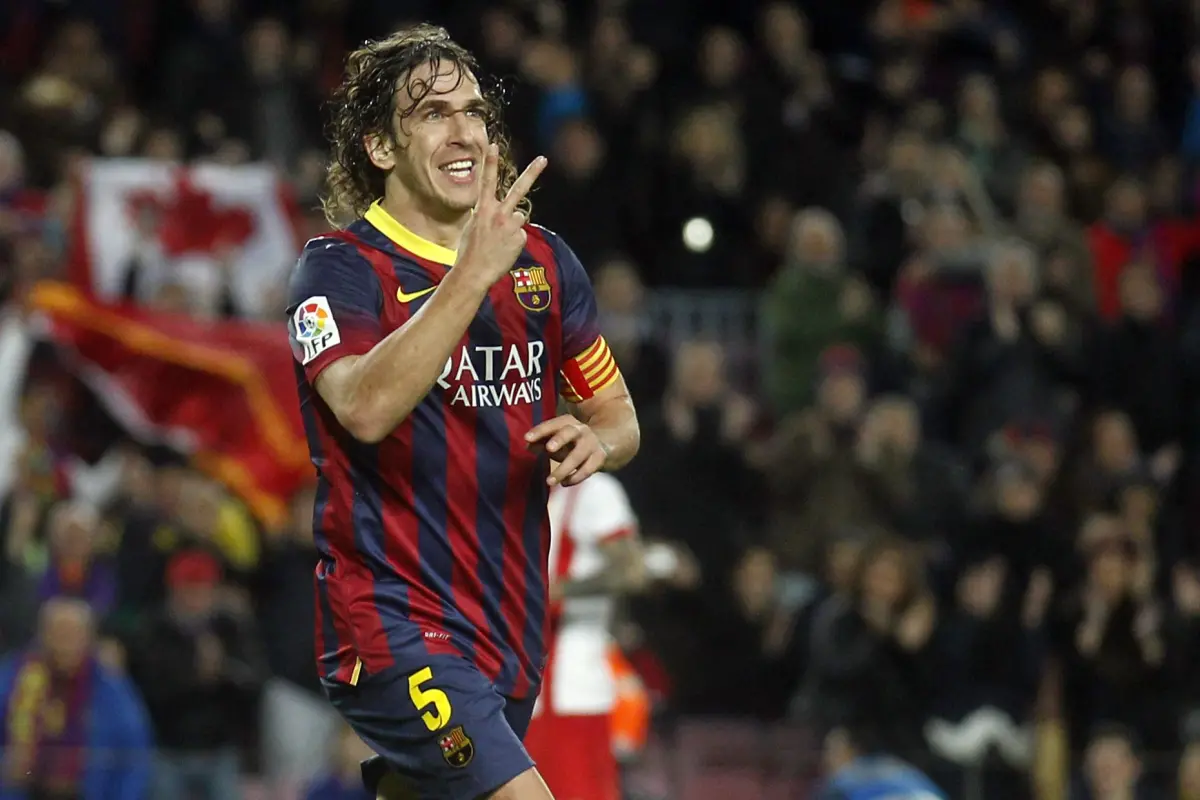 ▲出生於1978年4月13日的Carles Puyol迎來47歲生日，這位「鐵血隊長」是巴塞隆納與西班牙國家隊的傳奇後衛，以頑強防守、一頭捲髮與無私精神成為紅藍王朝象徵，退役後仍是足球界的精神典範。（圖／路透／達志影像）