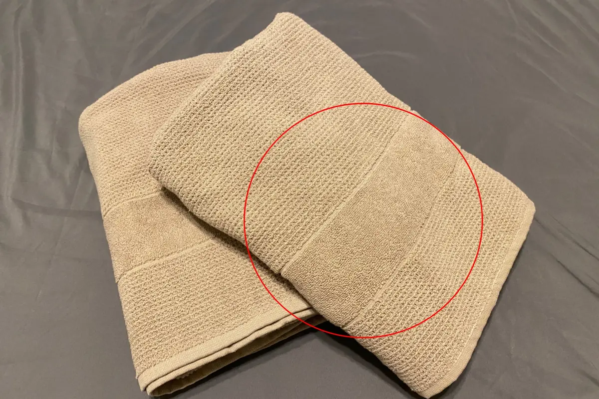 ▲毛巾上多出2條線，讓民眾搞不清楚有何用途，台灣與國外毛巾廠商過去曾解釋功能引起討論。（圖／取自photoAC）