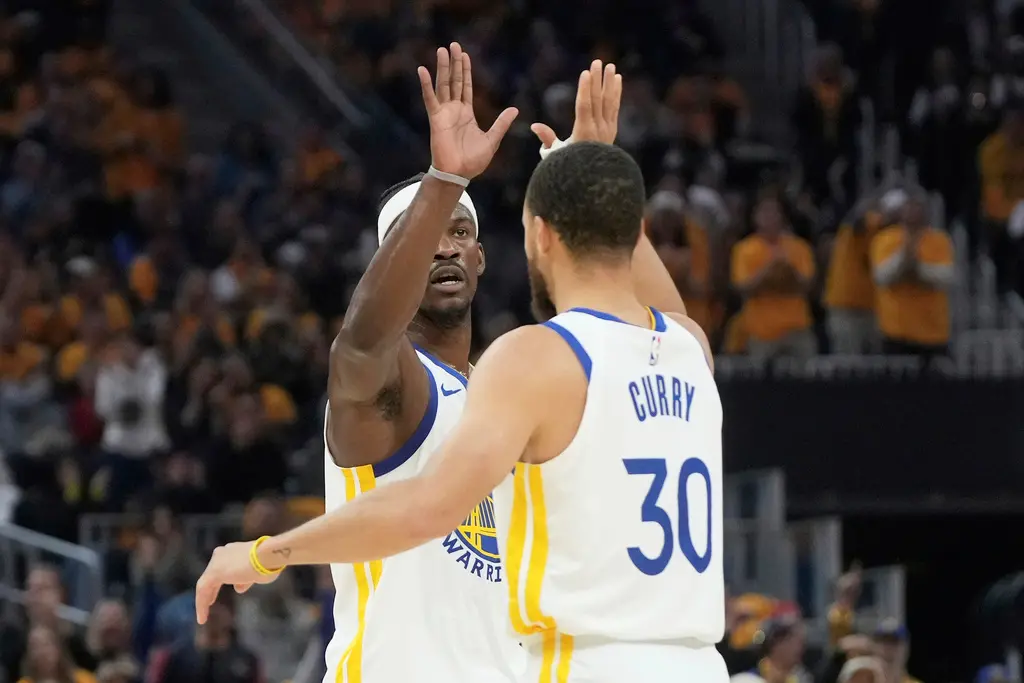 ▲西區第7種子金州勇士坐鎮主場迎戰第8種子曼菲斯灰熊。勇士「士官長」Jimmy Butler進入季後賽模式，全場狂砍38分，Stephen Curry也有37分進帳，兩人率領勇士以121：116贏球，拿下西區第7種子，晉級到NBA季後賽。（圖／美聯社／達志影像）