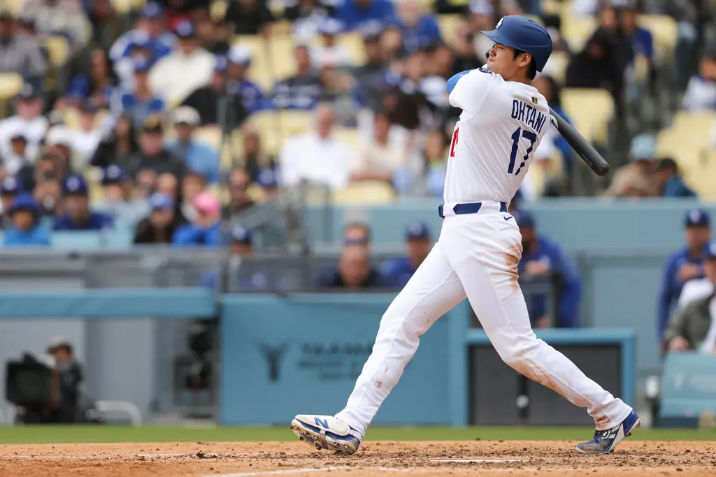 ▲美國職業棒球大聯盟（Major League Baseball）洛杉磯道奇今（30）日再度交手邁阿密馬林魚隊，大谷翔平為人父以來的首支全壘打出爐。（圖／美聯社／達志影像）