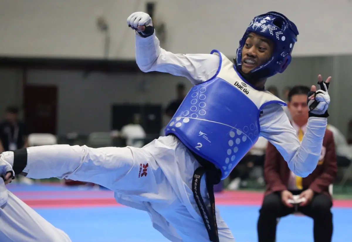 ▲大一跆拳道新星李祈恩在台南全大運初登場即展現驚人實力，於公開男子組54公斤級金牌戰中勝出，為彰師大在對打首日貢獻一面金牌。（圖／長榮大學114全大運執辦提供）
